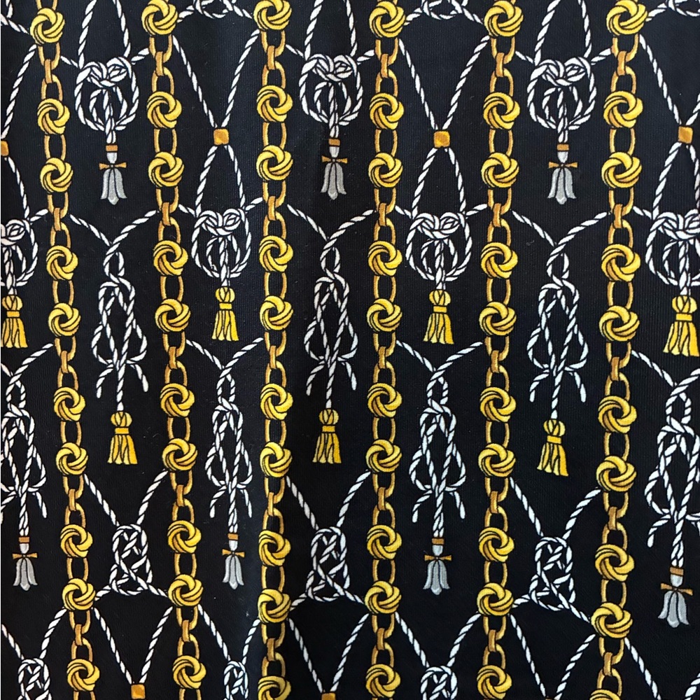 Elegant Black Dress with Gold and Silver Rope Pattern